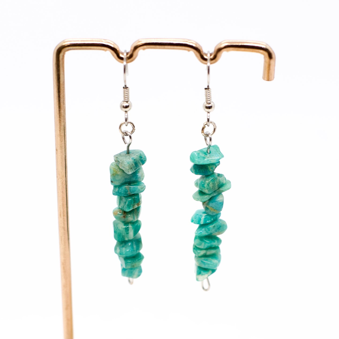 close up of Amazonite gemstone dangle earrings on earring stand 