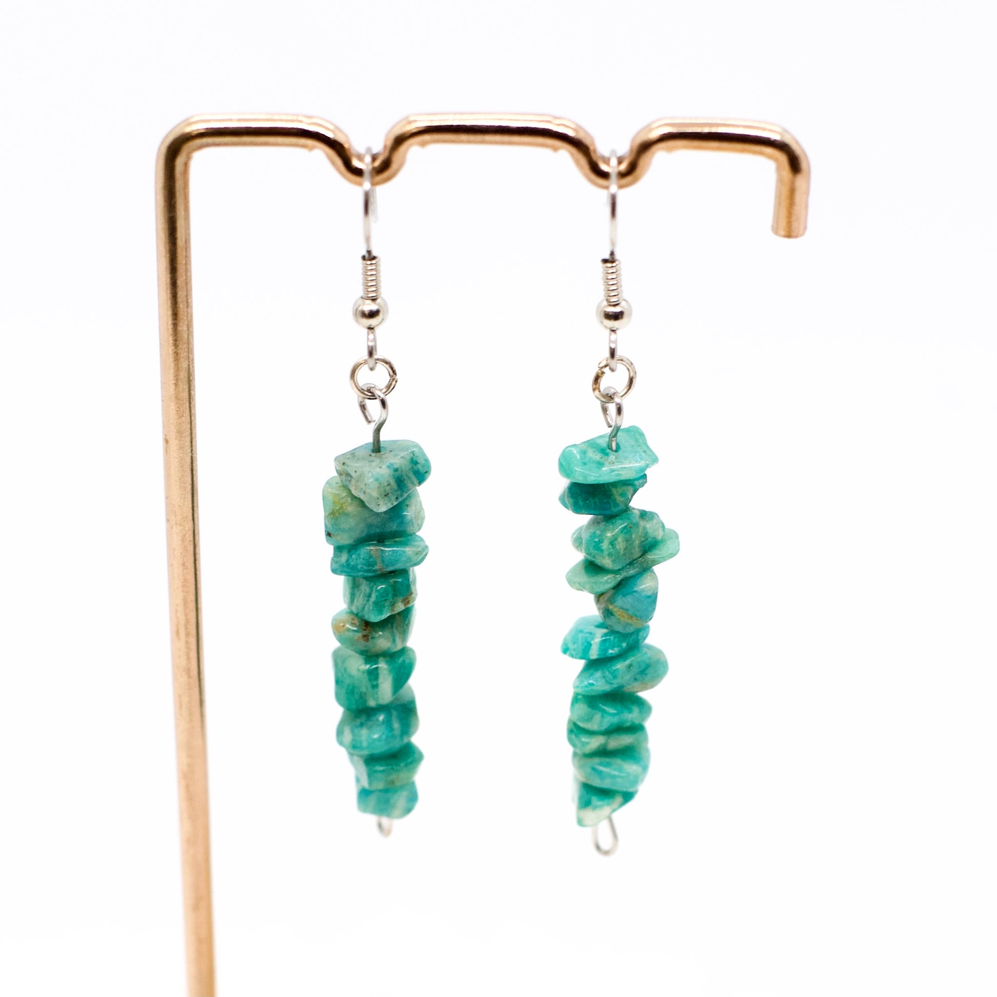 close up of Amazonite gemstone dangle earrings on earring stand 