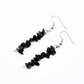 Black obsidian gemstone chip earrings on white background 