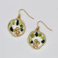 gold mushroom earrings with moss agate and peridot crystal gemstone chips on white background