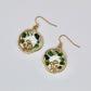 gold mushroom earrings with green crystals