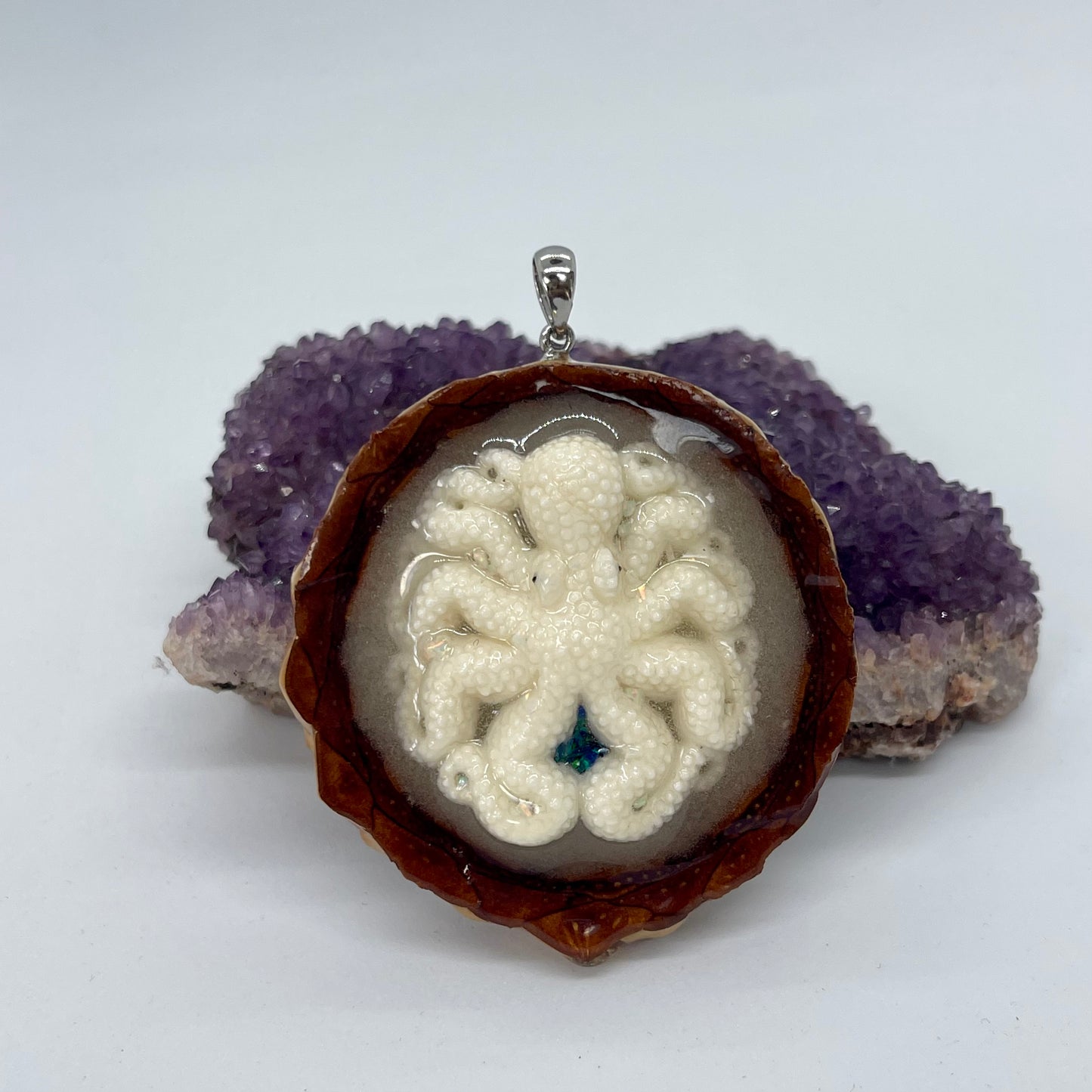 pinecone pendant with octopus carving and crushed opal with silver bail