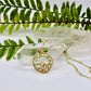 gold mushroom necklace with green gemstone chips 
